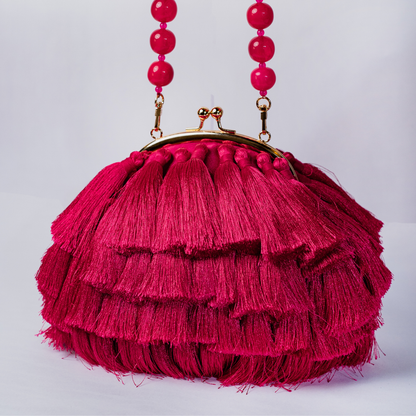 Rani Pink Tassel Clutch