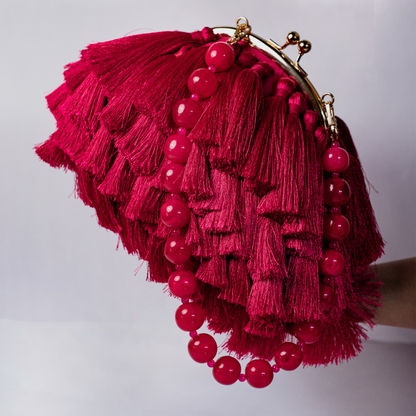 Rani Pink Tassel Clutch