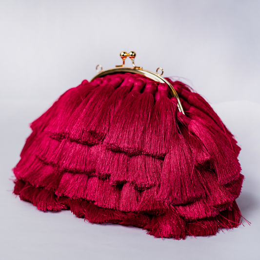 Rani Pink Tassel Clutch